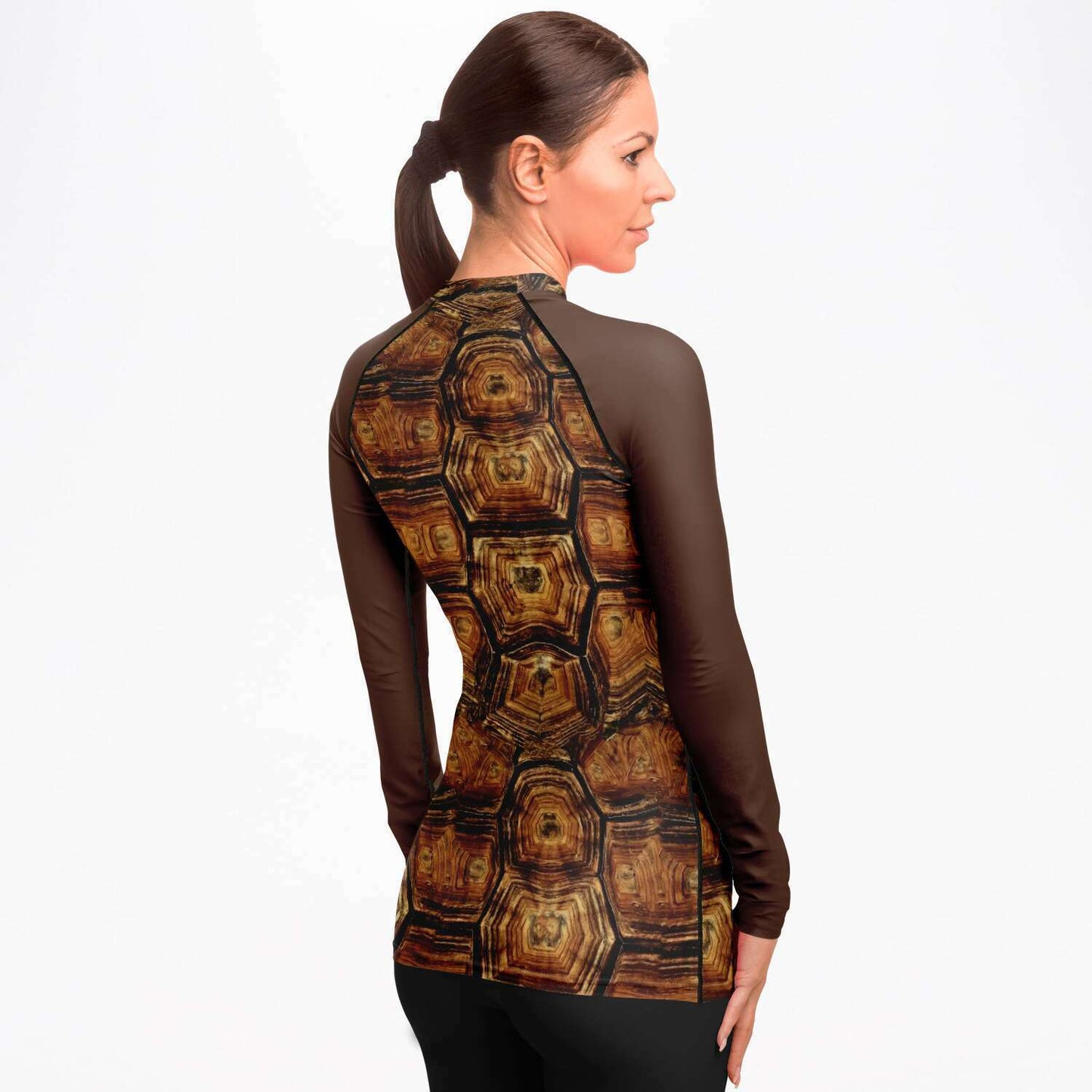 Back / side view of woman wearing turtle rash guard