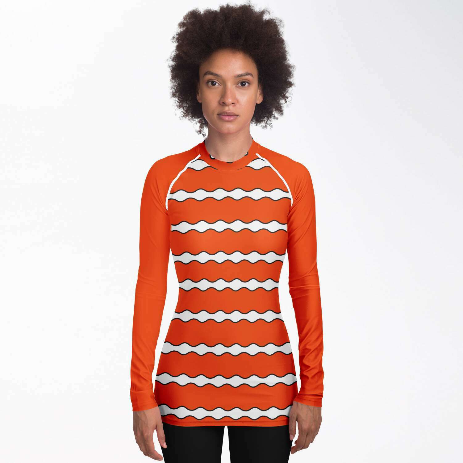 Front view of woman wearing women’s clownfish rash guard
