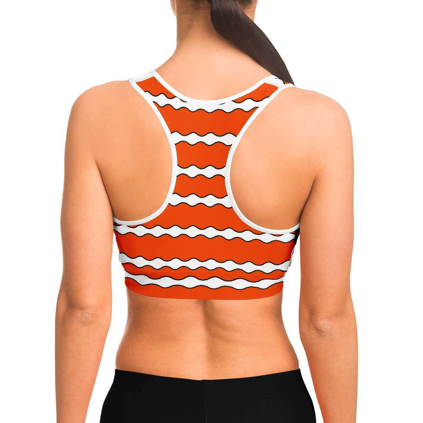 Back view of model wearing clownfish racer-back crop top / sports bra
