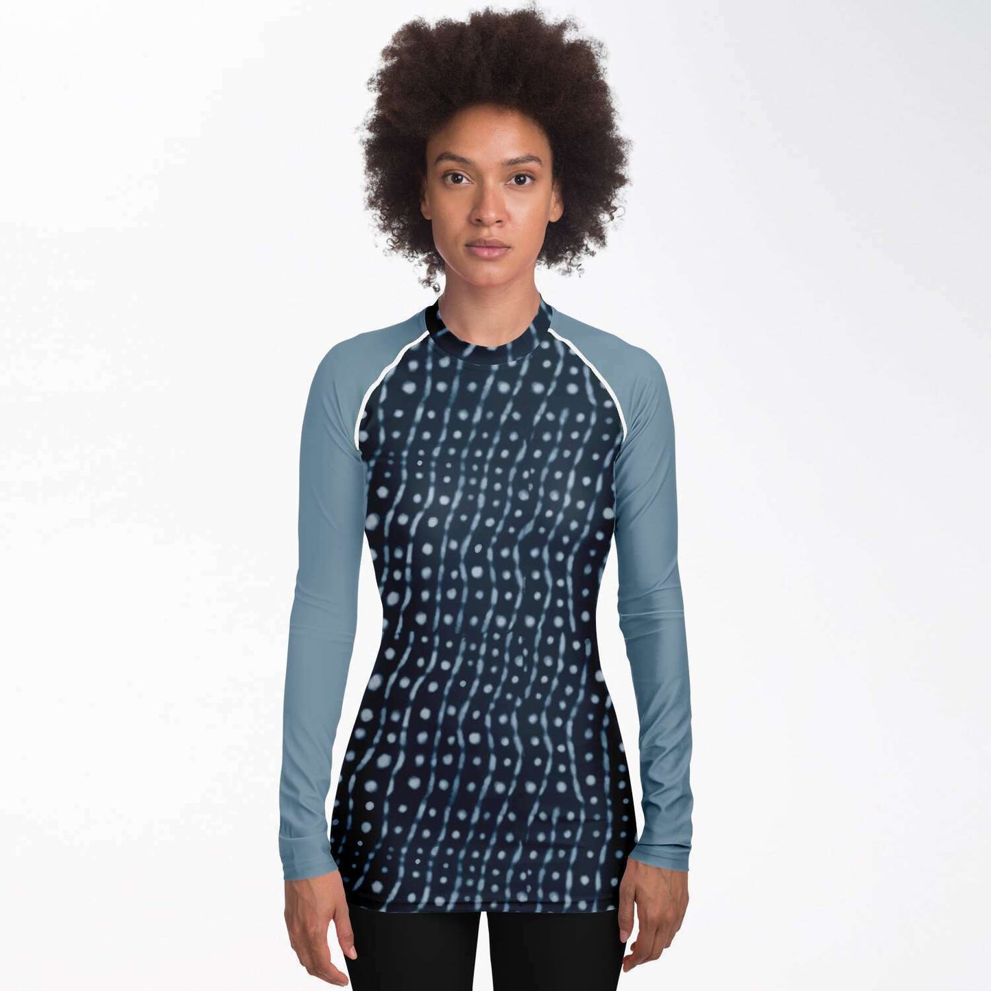 Front view of woman wearing whale shark rash guard
