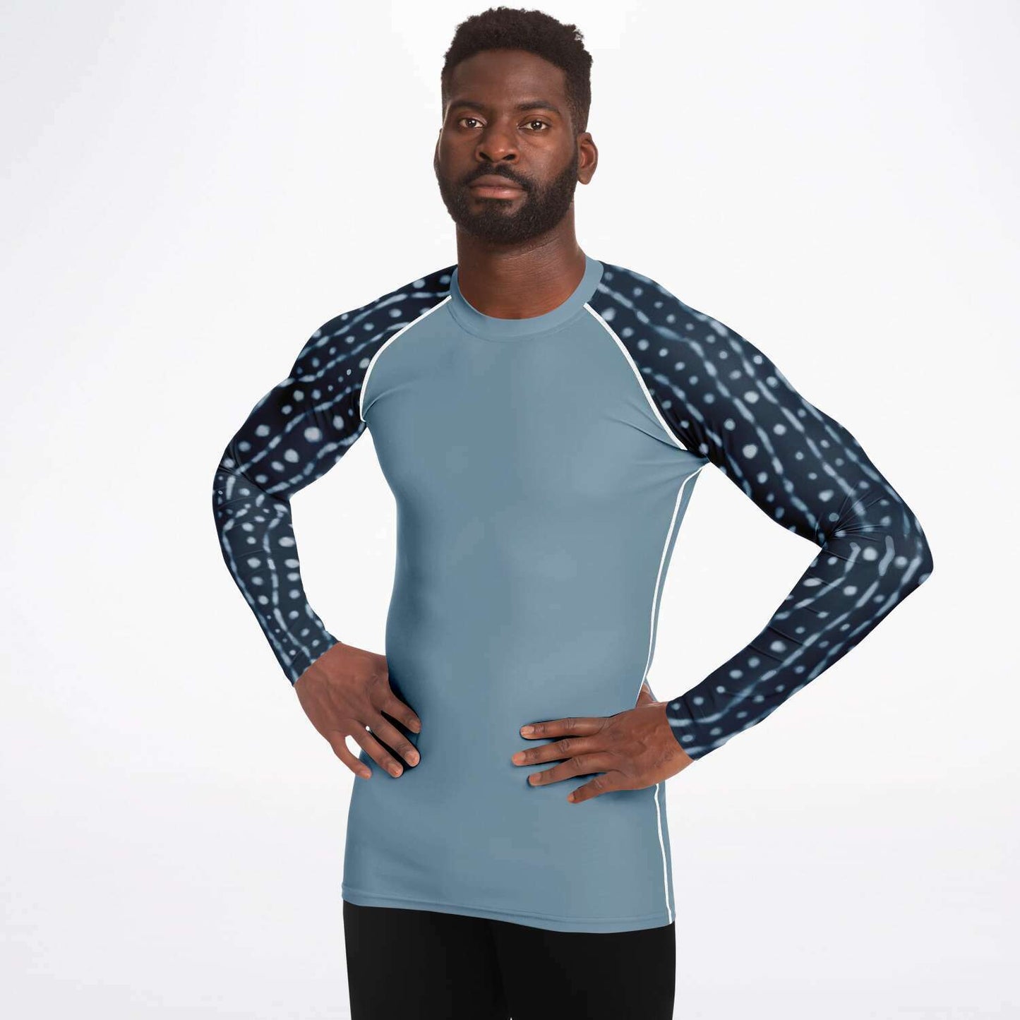 Front view of model wearing men’s whale shark rash guard