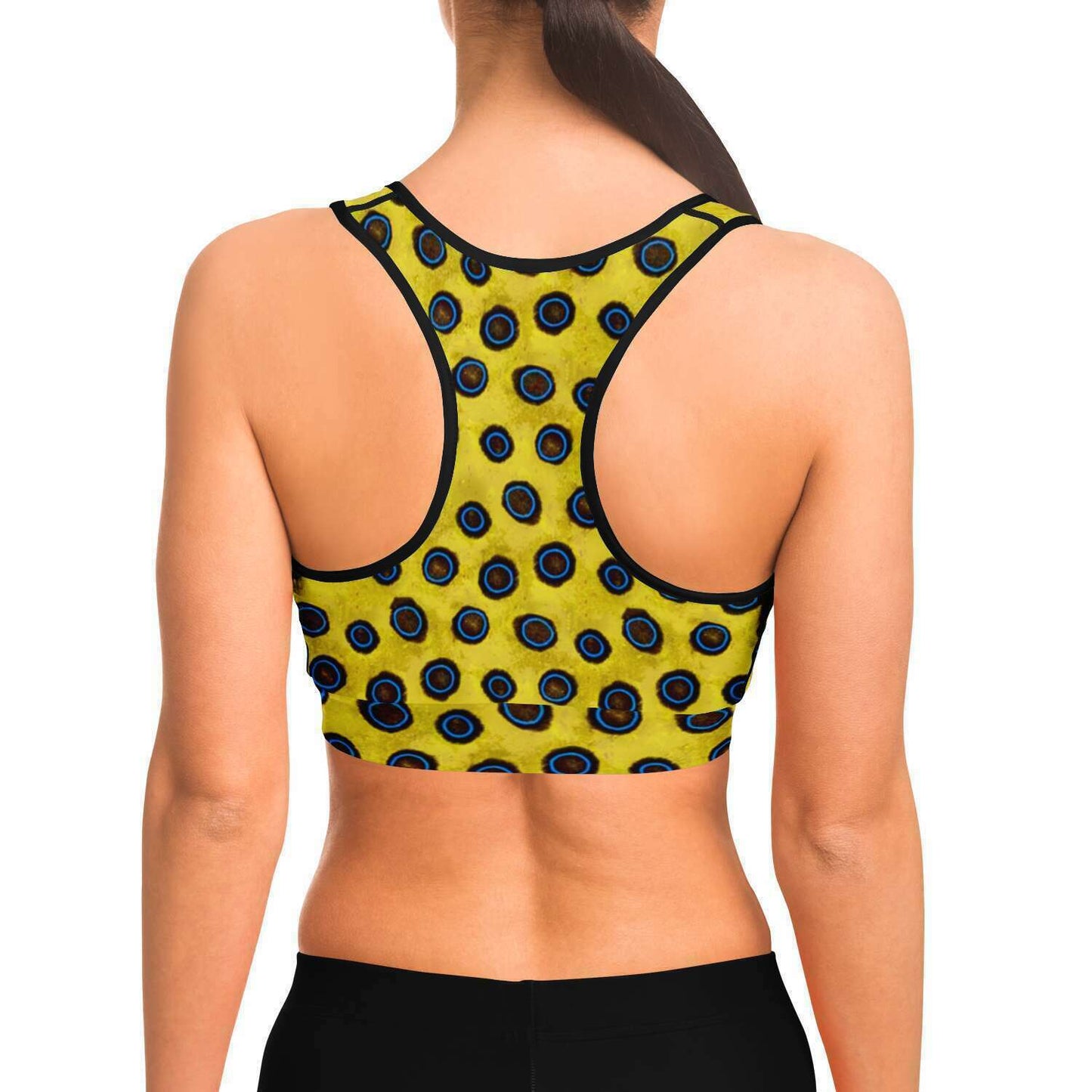 Back view of model wearing Blue-ringed octopus racer-back crop top / sports bra for any medium impact sport including scuba diving