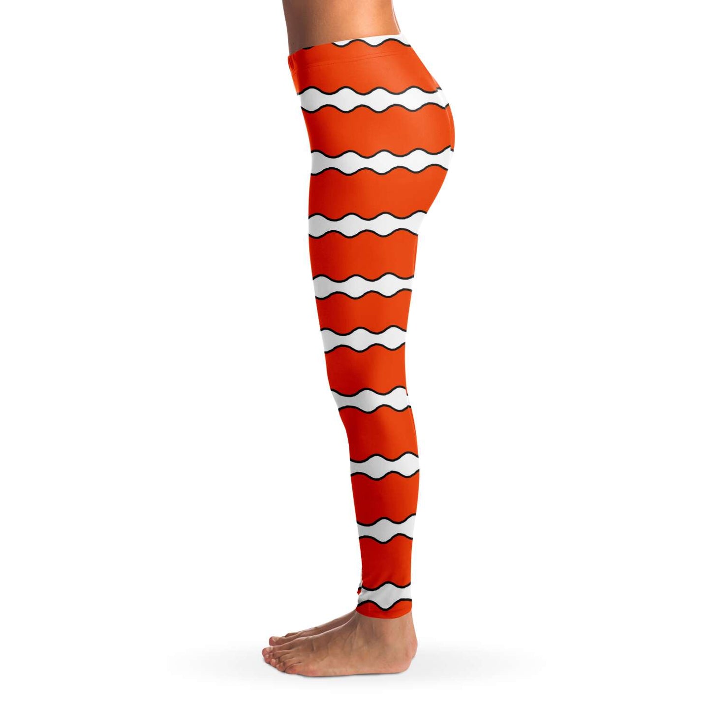 Side view on model of clownfish leggings / skins for scuba diving, yoga and other sports