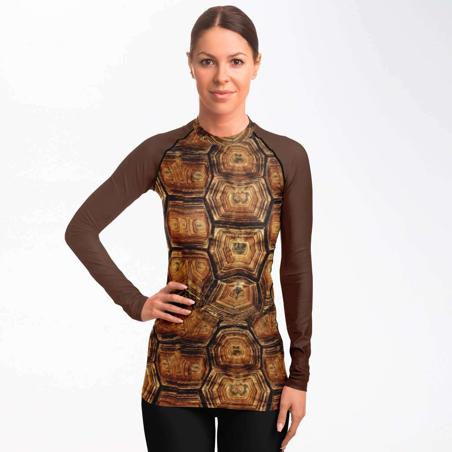 Front view of woman wearing turtle rash guard
