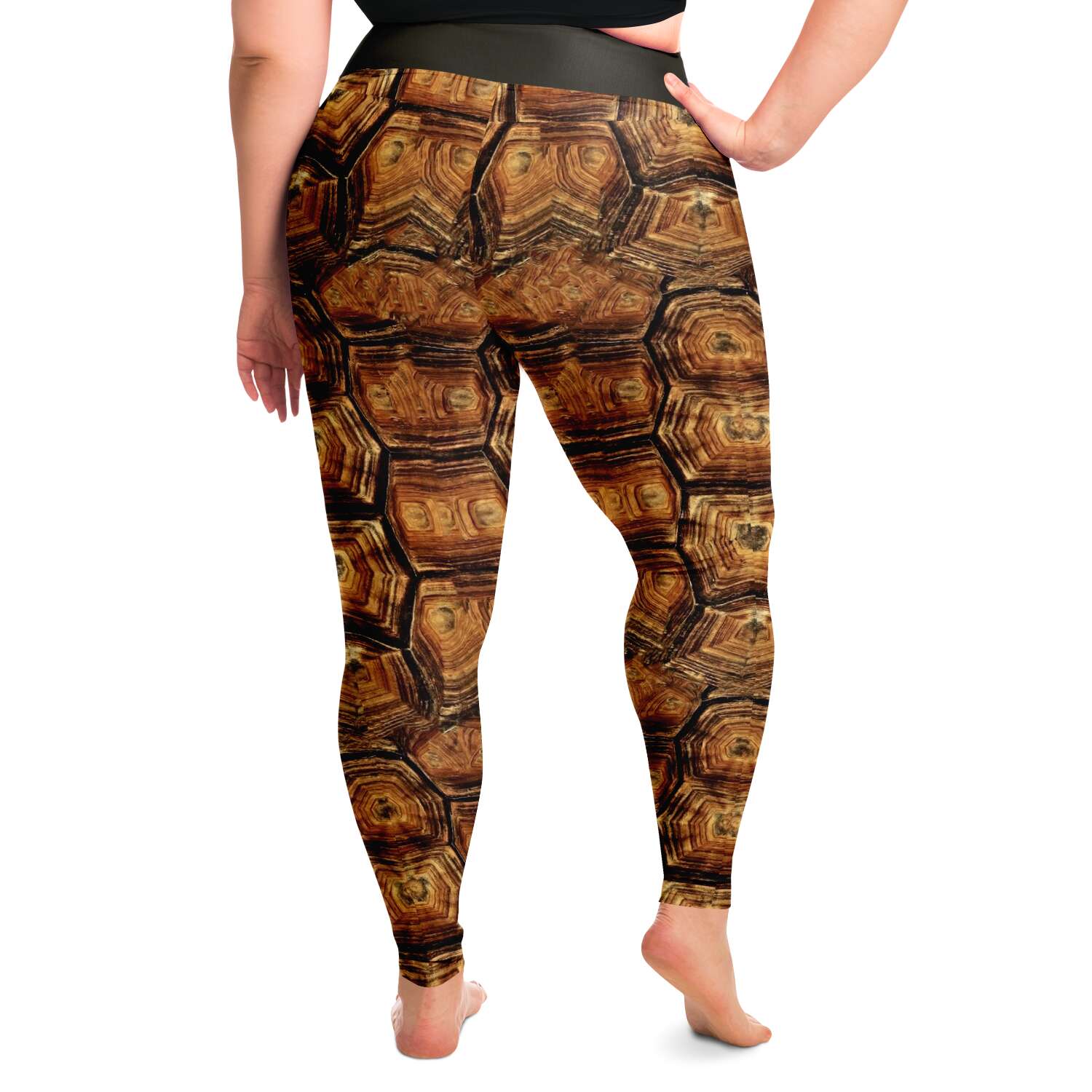 Side to back view of model wearing turtle leggings / skins