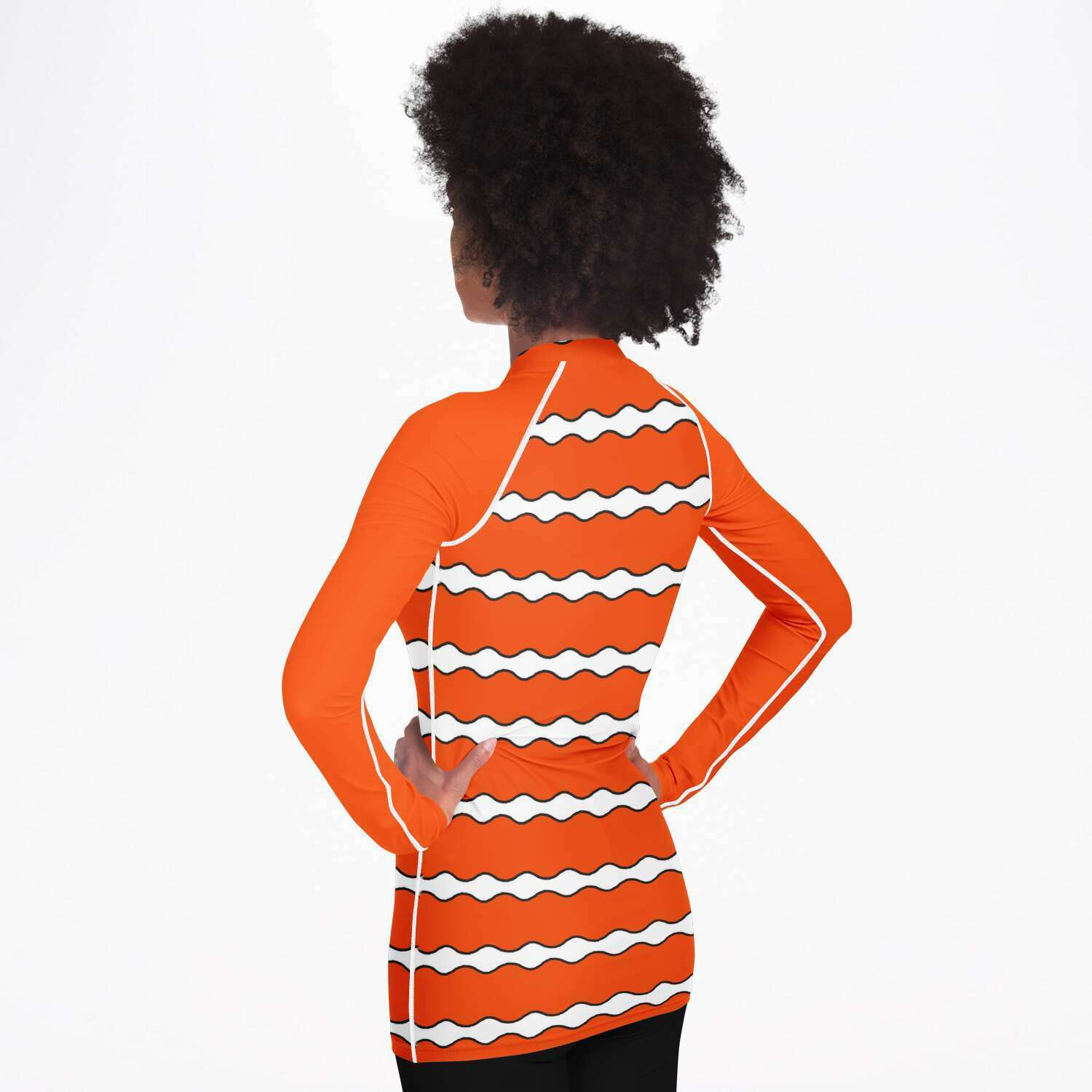 Back / side view of woman wearing women’s clownfish rashguard